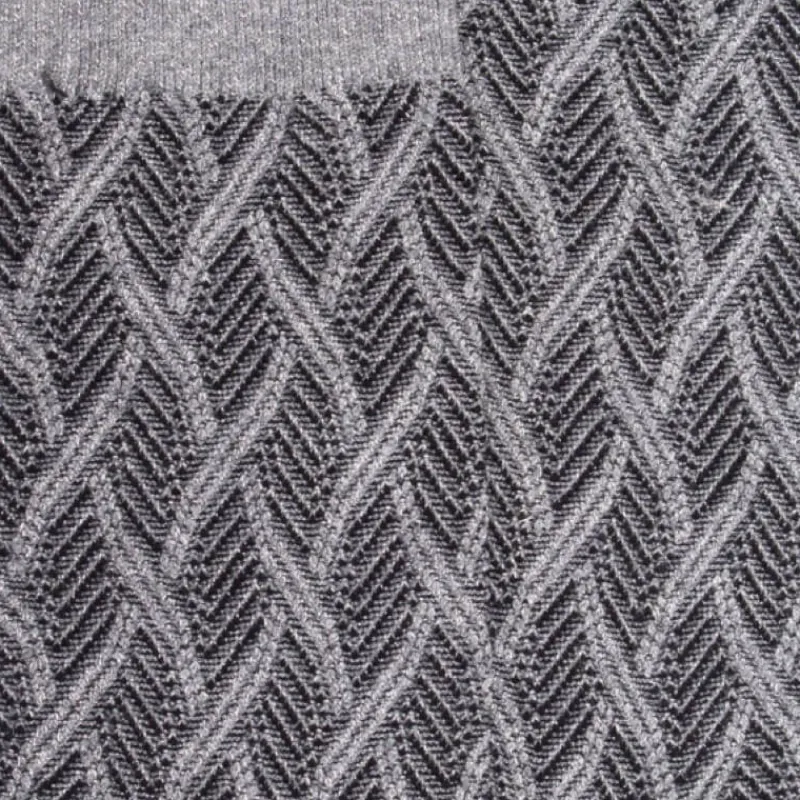 chaussettes_femme_en_coto_1-27.webp Femme Doré Doré Chaussettes^Chaussettes femme en coton et laine à motif entrelacés effet brillant - Gris oxford