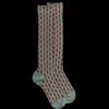 Femme Doré Doré Chaussettes Hautes^Chaussettes longues pour femmes, en laine à motifs étoilés -